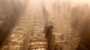 In this aerial photo, a burned neighborhood is seen in Paradise, California on November 15, 2018. - The toll in the deadliest wildfires in recent California history climbed to 59 on November 14, 2018, as authorities released a list of 130 people still missing.